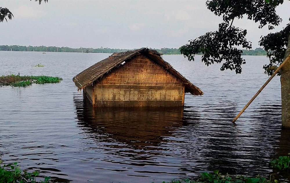 A house submerged in flood water, at Chamata in Nalbari district in Assam.