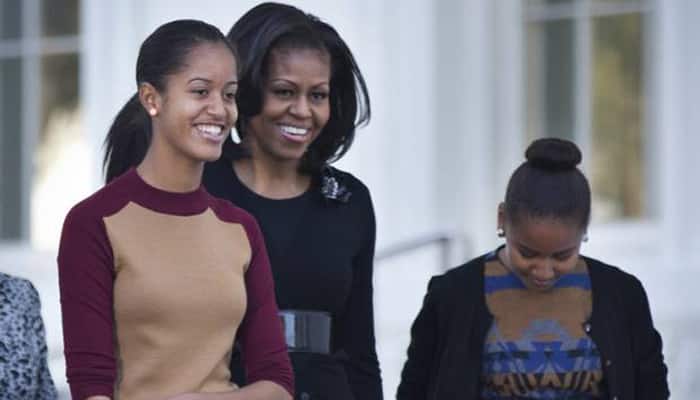Michelle Obama and daughters to visit Britain, Italy