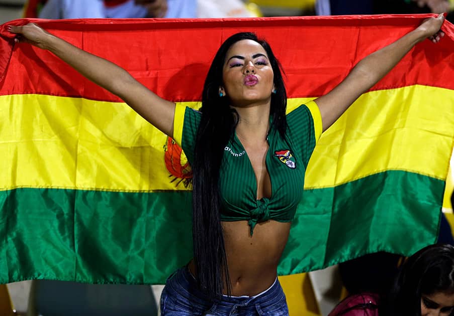 A Bolivia's fan cheers before a Copa America Group A soccer match between Mexico and Bolivia at the Sausalito Stadium in Vina del Mar, Chile.