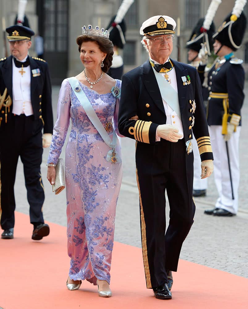 Sweden's King Carl Gustaf, right, and Queen Silvia for the wedding of their son, Prince Carl Philip and Sofia Hellqvis, , in Stockholm, Sweden.