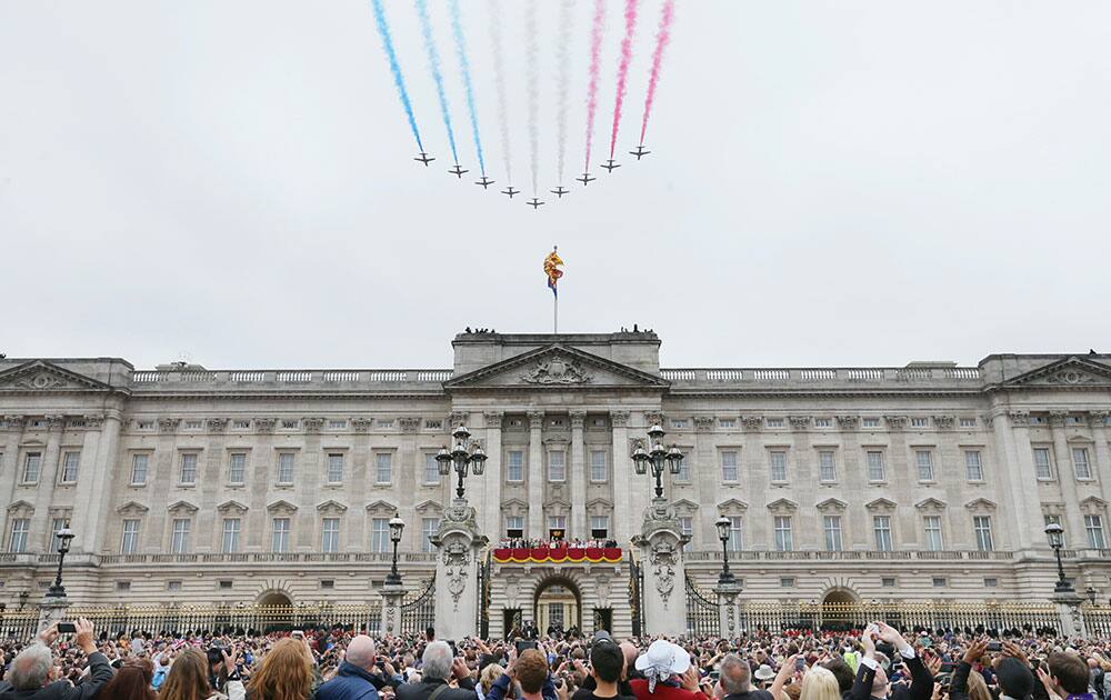 The Red Arrows make a flypast during the Trooping The Colour parade at Buckingham Palace, in London.