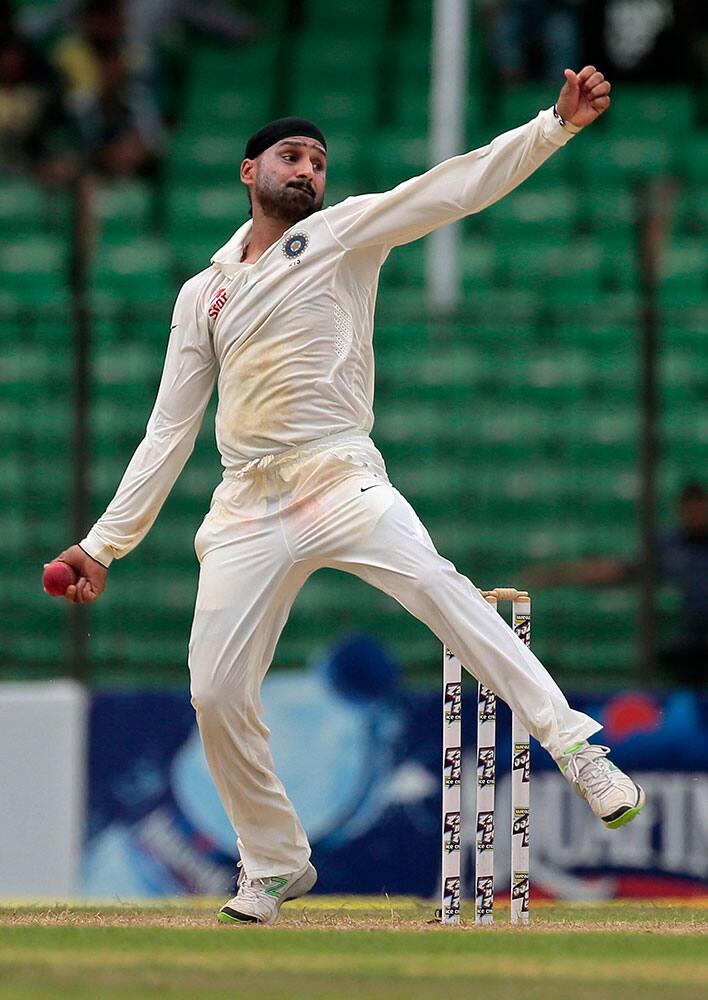 India’s Harbhajan Singh bowls on the last day of their test cricket match against Bangladesh in Fatullah.