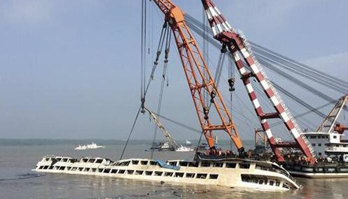 China puts ship disaster survivors at 12, says all 442 bodies found