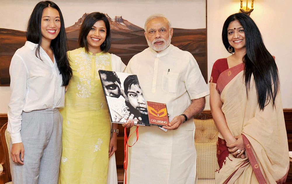 Prime Minister Narendra Modi meeting representatives of Girl Rising campaign in New Delhi.