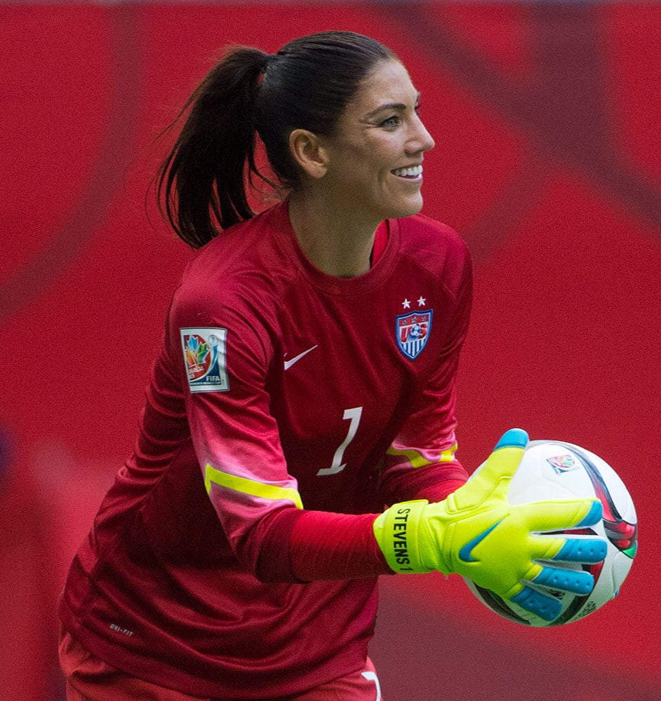 United States goalkeeper Hope Solo makes a save during second half against Nigeria in a FIFA Women's World Cup soccer game, in Vancouver, British Columbia, Canada.