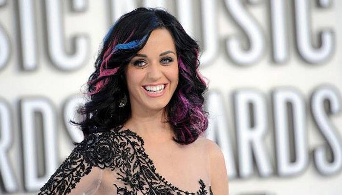 Katy Perry `almost` strips down for new Moschino ad