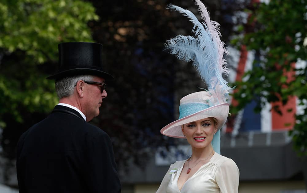 Lana Holloway poses for a photograph on the first day of Royal Ascot horse racing meet at Ascot, England