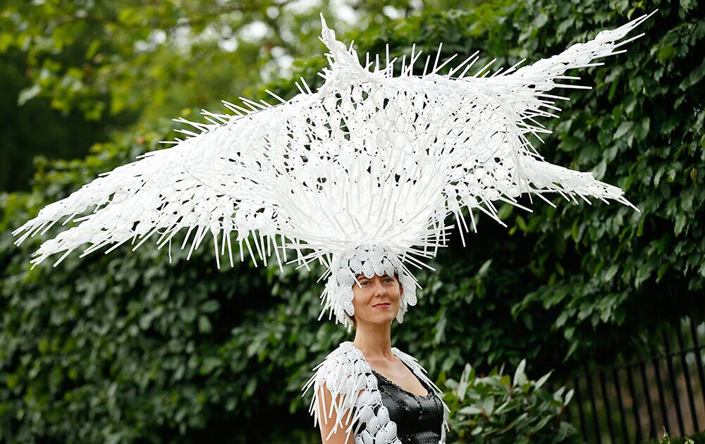 Larissa Katz poses for photographers on the second day of Royal Ascot horse racing meet at Ascot, England.