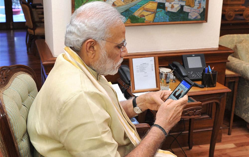 Prime Minister Narendra Modi launching the Narendra Modi Mobile App in New Delhi.