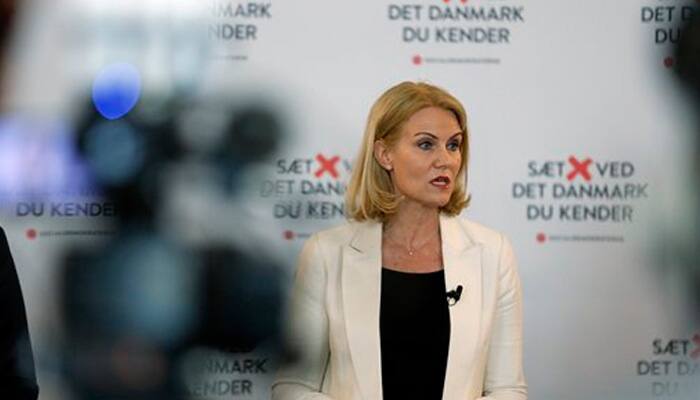 Danish PM seeks second term in closely fought race