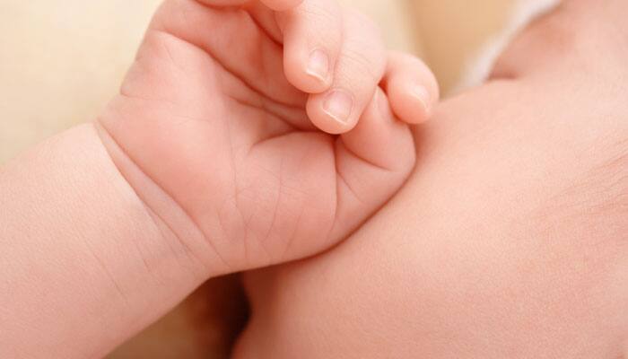 Australian banned from breastfeeding over tattoo
