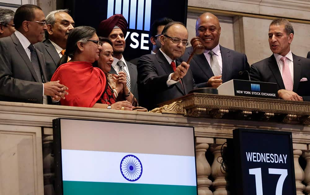 Arun Jaitley gavels the market closed after he rang the closing bell of the New York Stock Exchange in New York.