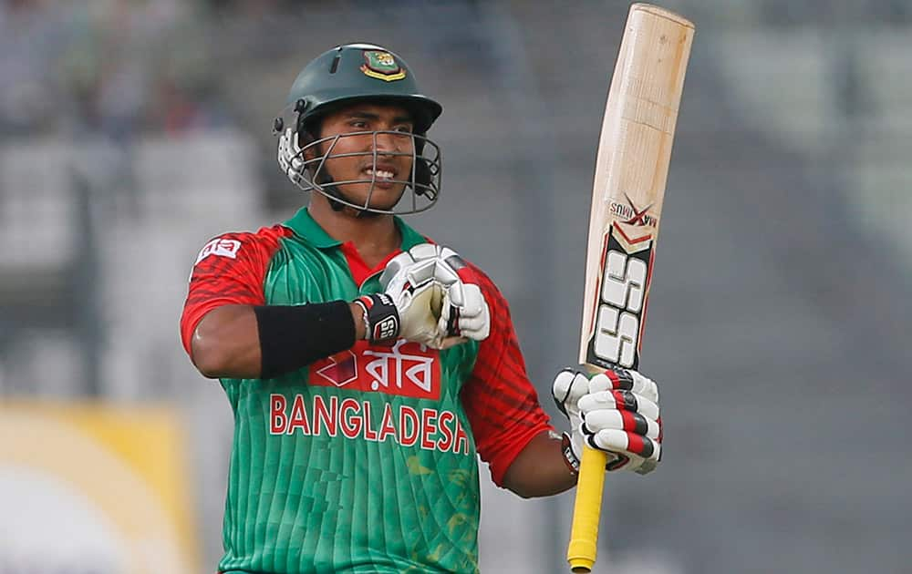 Bangladesh’s Soumya Sarkar acknowledges the crowd after scoring fifty runs during the first one-day international cricket match against India in Dhaka, Bangladesh.