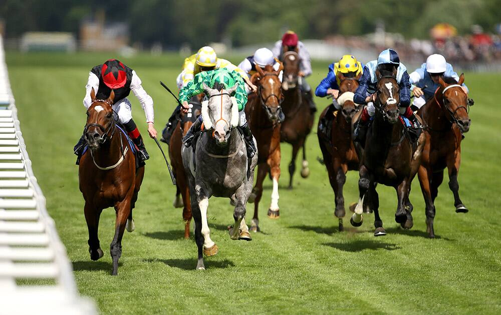 Free Eagle ridden by jockey Pat Smullen, left, comes home to win the Prince Of Wales's Stakes ahead of The Grey Gatsby during day two of the 2015 Royal Ascot Meeting at Ascot Racecourse, England.