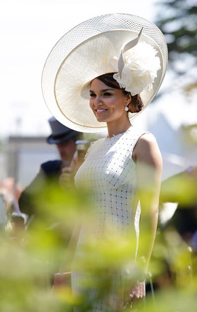 Samantha Barks wears an ornate hat on the third day of the Royal Ascot horse racing meet at Ascot, England.