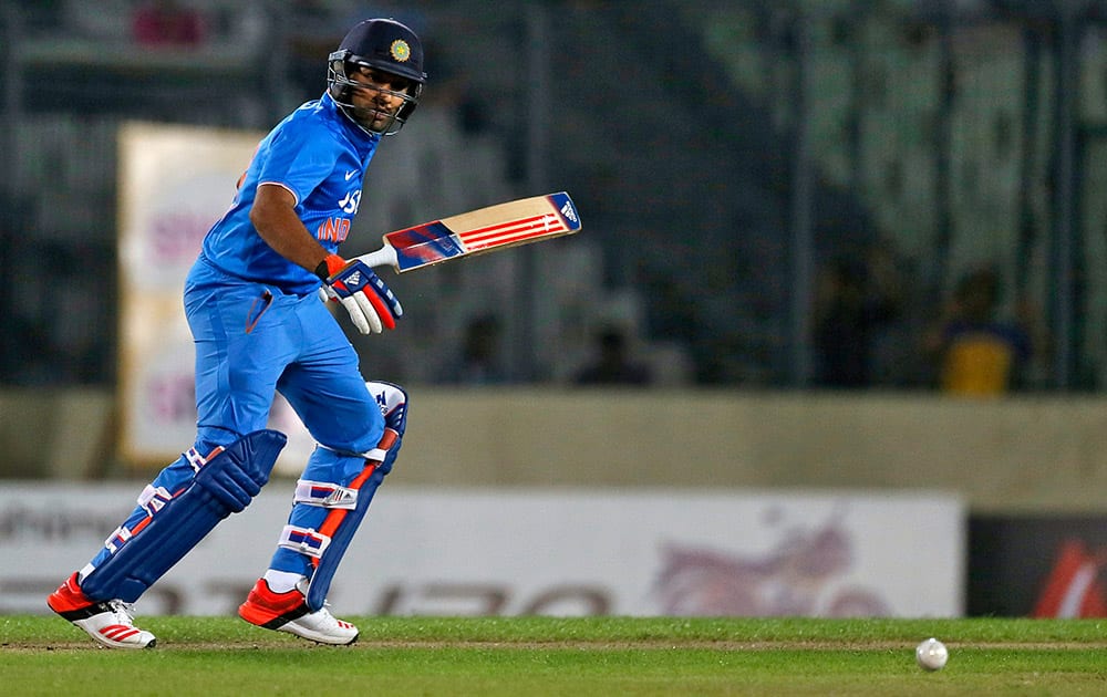 Rohit Sharma plays a shot during the first one-day international cricket match against Bangladesh in Dhaka, Bangladesh.