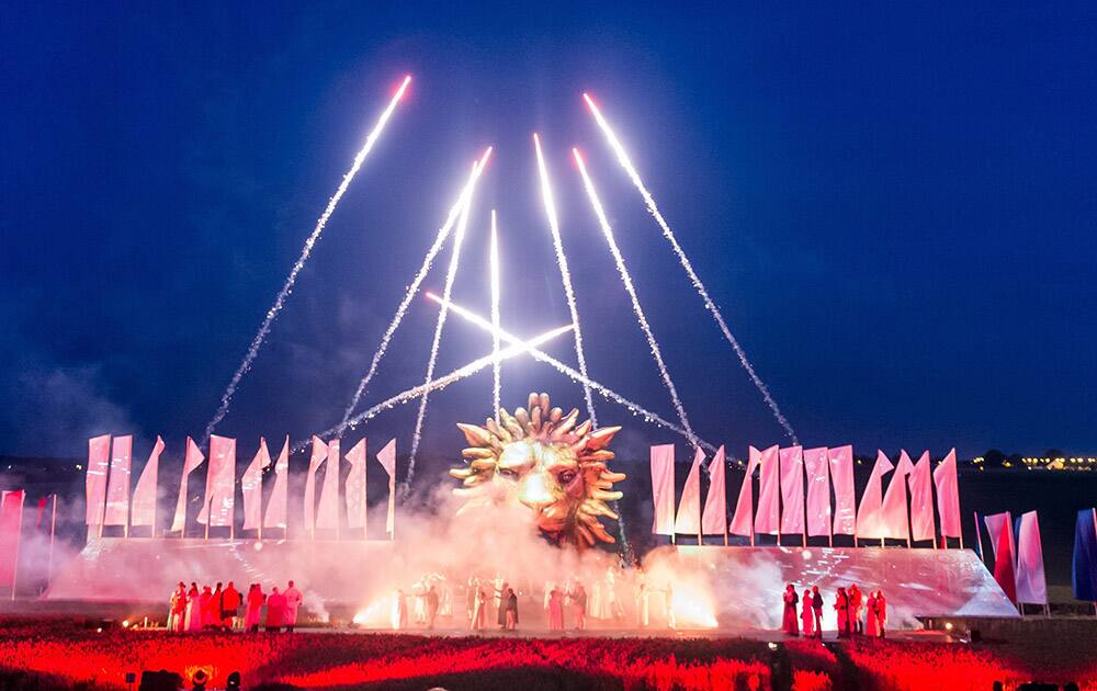 Re-enactors depict scenes during the show Inferno, as part of the commemoration of the bicentenary of the battle of Waterloo in Braine-lAlleud, near Waterloo, Belgium.