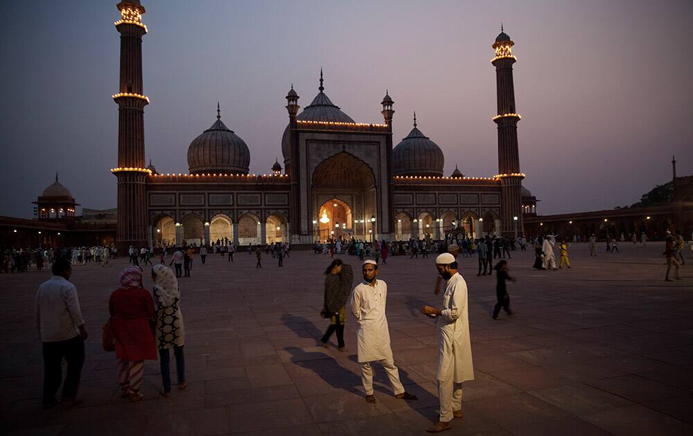Muslims stand inside the premises of Jama Masjid on the eve of Ramadan in New Delhi.