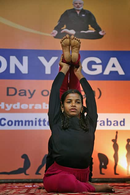 Children participate in a yoga convention program in Hyderabad. Sunday, June 21, marks the first International Yoga Day, which the government of India’s Prime Minister Narendra Modi is marking with a massive outdoor New Delhi gathering.