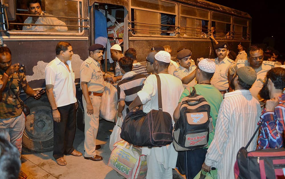 Pakistani fishermen released from Indian jails being departed from Dwarka in Gujarat on Friday for Wagah border for their repatriation to Pakistan.