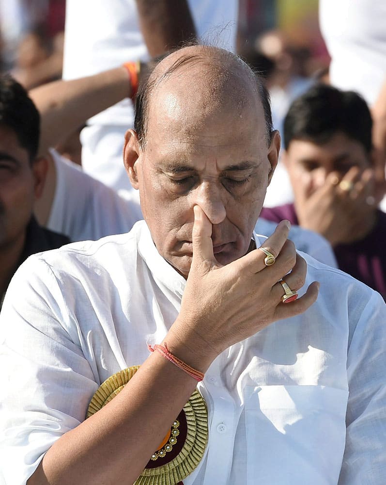 Union Home Minister Rajnath Singh performs Yoga at a mass yoga session to celebrate International Day of Yoga 2015 in Lucknow.