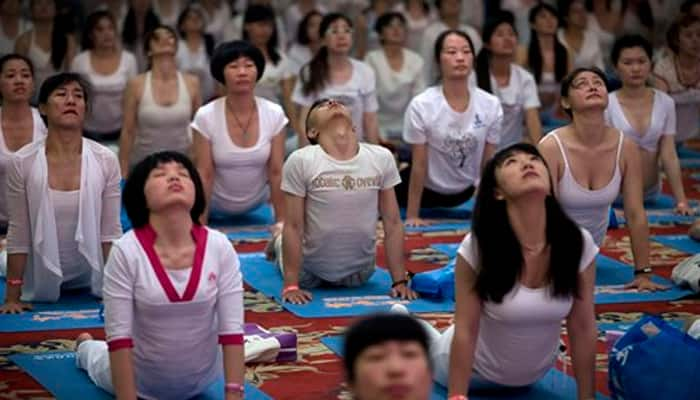 Thousands in China observe International Yoga Day 