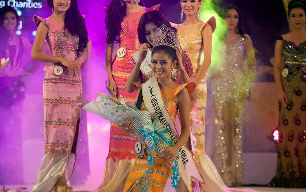 L Bawk Nu, winner of Miss Golden Land Myanmar, receives the crown during Miss Golden Land Myanmar Beauty Contest at Myanmar Convention Center.