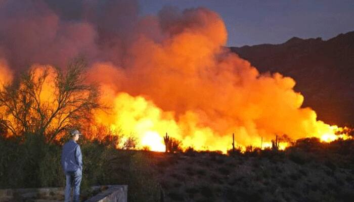 Firefighters battle major blazes as US West faces more heat