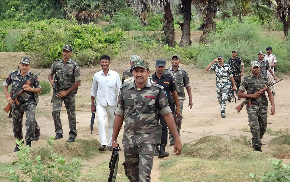 Security personnel at a combing operation against Maoists in the Nawadah forest.
