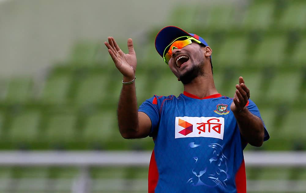 Bangladesh’s captain Mashrafe Mortaza laughs during a practice session ahead of their third one-day international cricket match against India in Dhaka, Bangladesh.