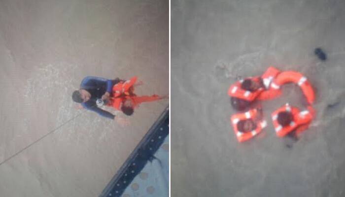 Navy, Coast Guard rescue 14 crew from sinking vessel