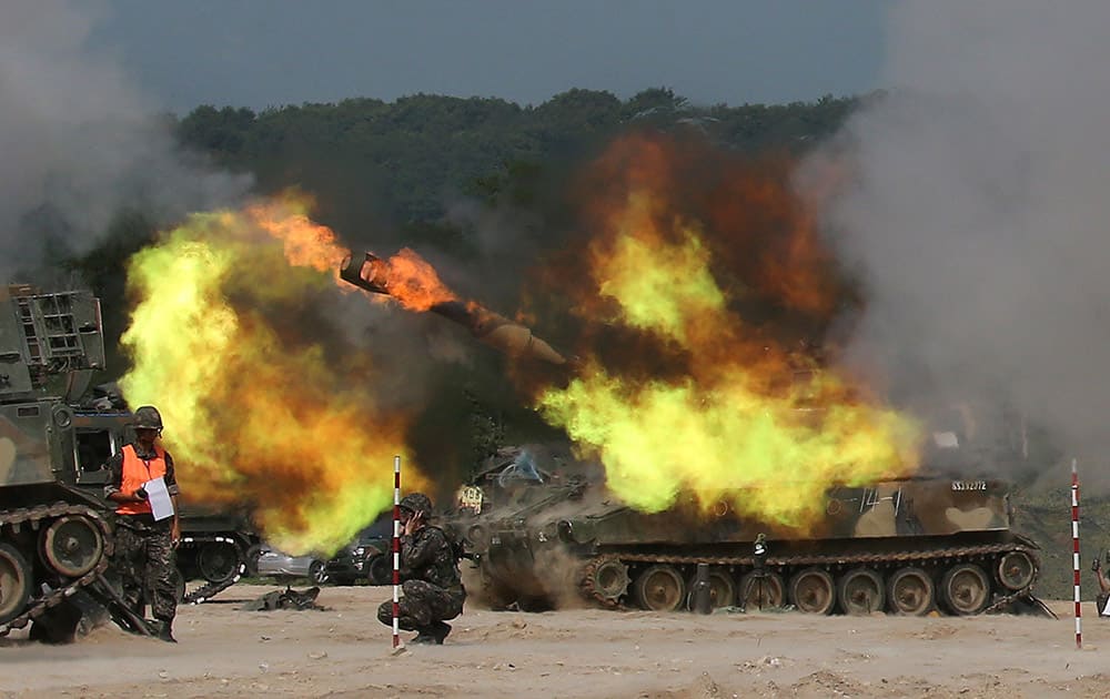 South Korean army's K-55 self-propelled howitzer fires during a military exercise to mark the 65th anniversary of the start of the 1950-1953 Korean War at a fire training field in Cheorwon, north of Seoul, South Korea.