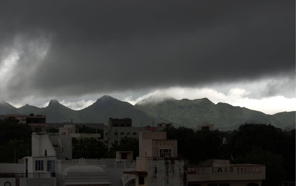 Heavy dark clouds over the Hills - Udaipur India
