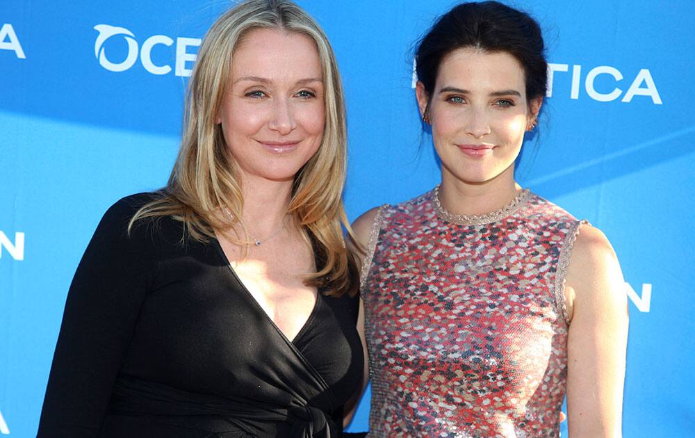 Alexandra Cousteau, left, and Cobie Smulders, attend the 1st Annual Nautica Oceana City & Sea Party at the Gansevoort Park Avenue Roofdeck in New York.