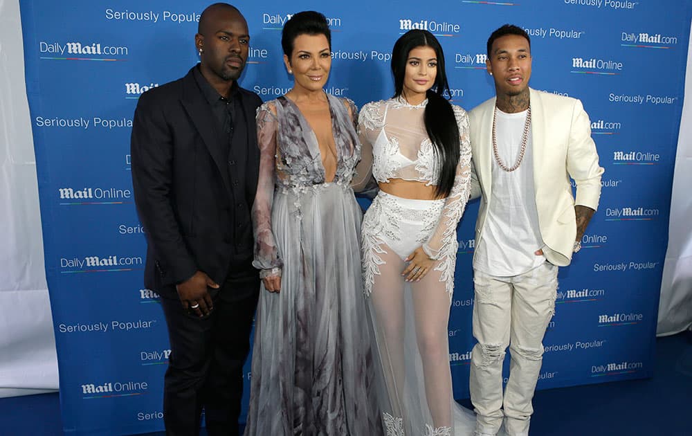 Kris Jenner, second from left with her boyfriend Corey Gamble, left, pose with Kylie Jenner and her boyfriend Tyga during a photo call at the Cannes Lions 2015, International Advertising Festival in Cannes, southern France.