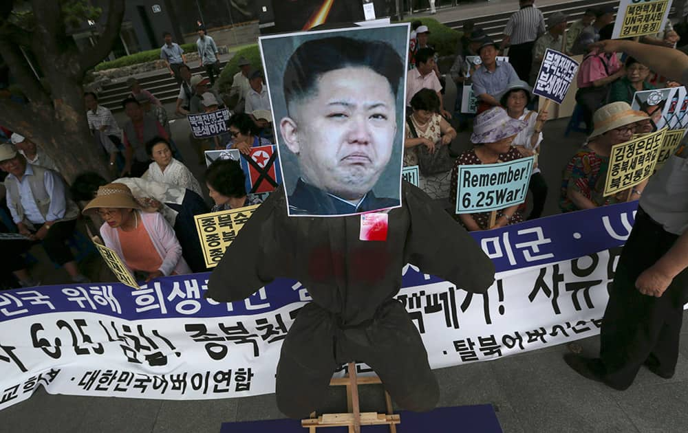 An effigy of North Korean leader Kim Jong Un is set up by South Korean conservative activists during a rally against the North to mark the 65th anniversary of the outbreak of the Korean War, in Seoul, South Korea.