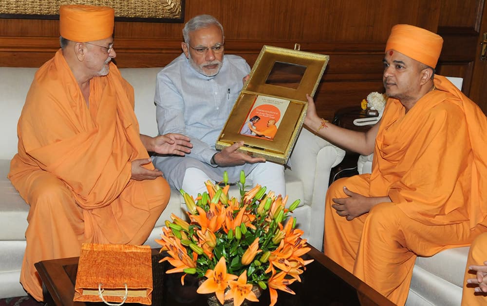 Prime Minister Narendra Modi meets Shri Brahmvihari Swamy.