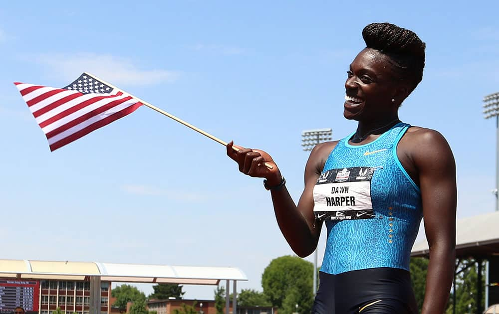 Dawn Harper-Nelson celebrates after winning the women's 100-meter hurdles at the U.S. track and field championships in Eugene, Ore.