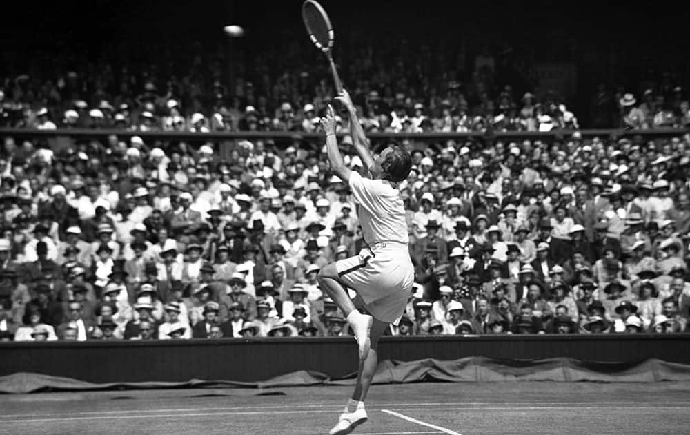 In this July 6, 1935 file photo, Helen Wills Moody regains the women's singles championship when she defeated Helen Jacobs in the final at the All England Lawn Tennis Championships in Wimbledon, London. 