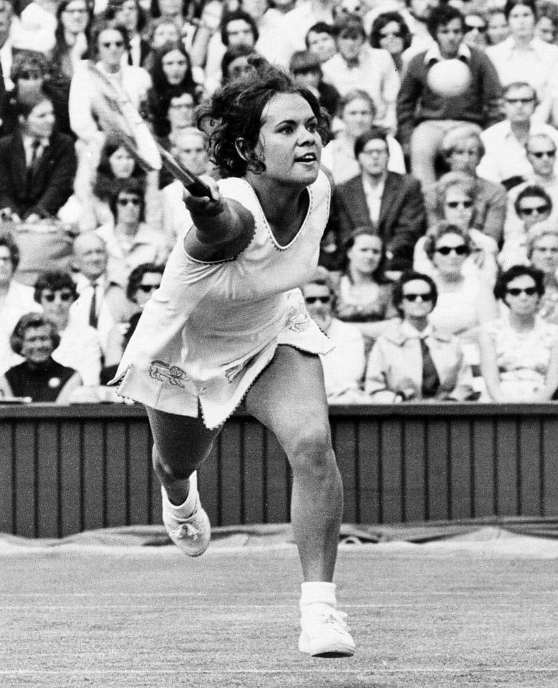 In this 1971 file photo, Australia's Evonne Goolagong shown in action during the All-England Tennis Championships at Wimbledon, England. 