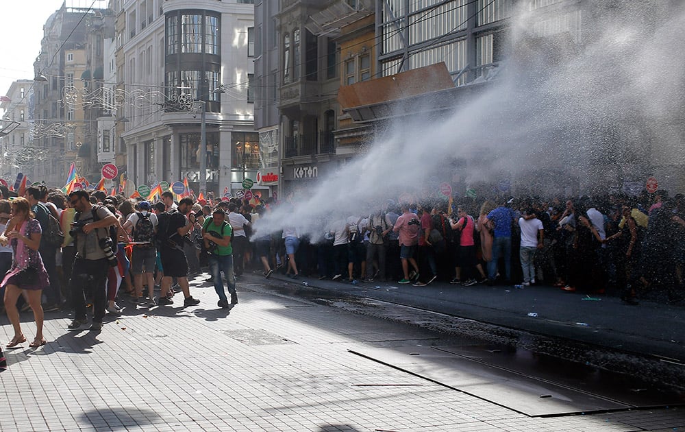 Turkish police use a water canon to disperse participants of a Gay Pride event in support of Lesbian, Gay, Bisexual and Transsexual (LGBT) rights in Istanbul, Turkey.