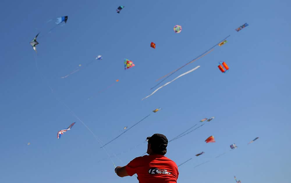 A member of a French team performs during an international kite festival in Alcochete, near Lisbon, Portugal.