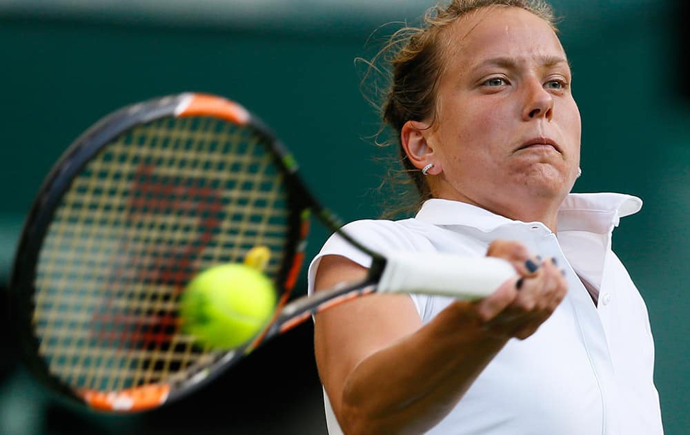 Barbora Strycova of the Czech Republic returns a ball to Sloane Stephens of the United States during the women's singles first round match at the All England Lawn Tennis Championships in Wimbledon, London.