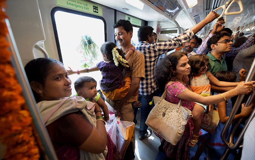 People on board a metro train after Tamil Nadu CM J Jayalalithaa flagged off the Chennai Metro Rail Limiteds passenger services between Alandur and Koyambedu through video conference, in Chennai.