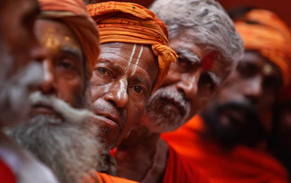 Hindu holy men line up to register for the annual pilgrimage to the Himalayan cave shrine Amarnath, in Jammu.