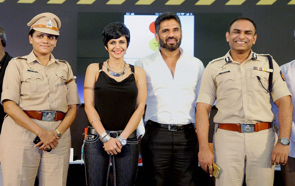 Suneil Shetty with actress Mandira Bedi and Joint Commissioner (Traffic) Milind Bharambe at the launch of Street Smart, Street Safe, a road safety campaign in Mumbai.