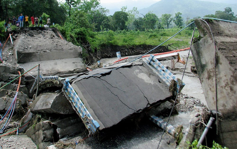 Rathikhola Bridge collapses due to heavy rains in Darjeeling.