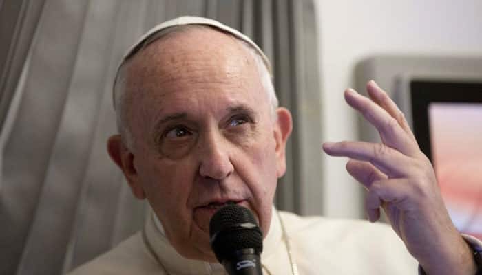 Pope Francis backs Greeks in euro crisis, says human dignity vital 