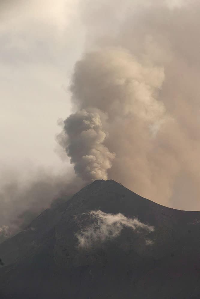 Volcan de Fuego or Volcano of Fire blows outs a thick cloud of ash as seen from San Miguel Duenas, Guatemala.