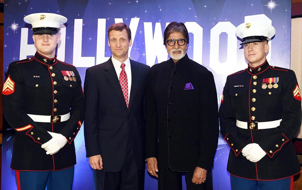 US Consulate General, Thomas Vajda and Bollywood superstar, Amitabh Bachchan pose for a photo opportunity with US Marines during the the 239th anniversary of US Independence in Mumbai.